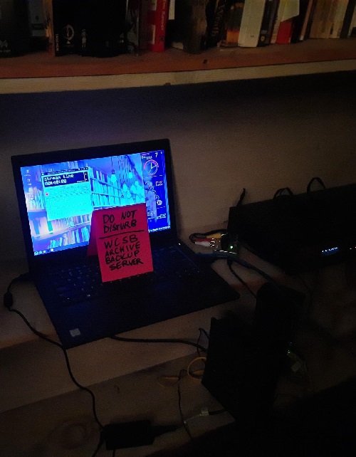 Community Tuner Laptop with Don't Touch Sign